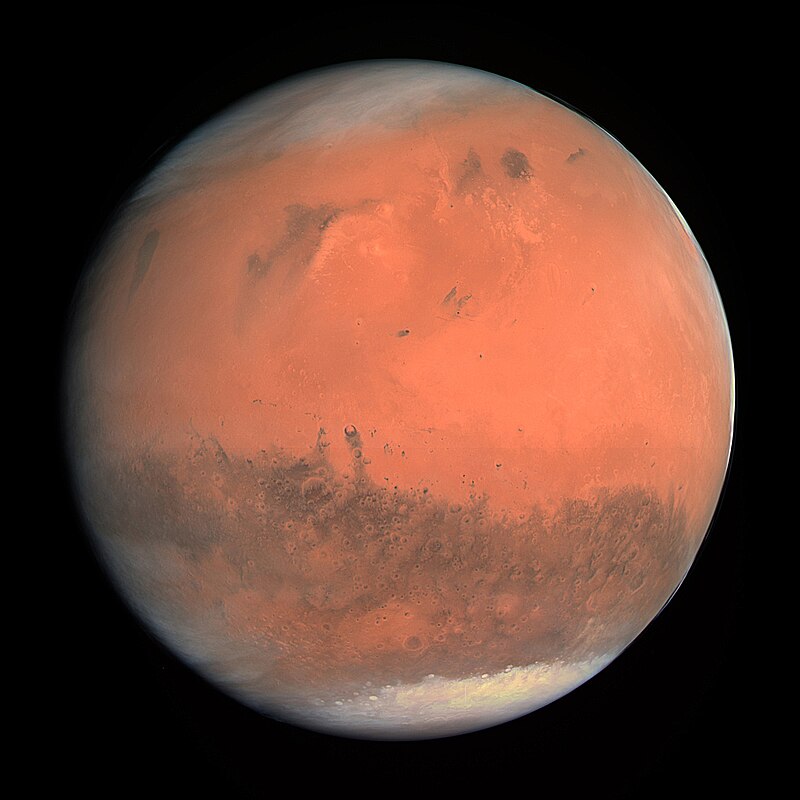 Mars ve skutečných barvách. Snímek pořídila sonda Rosetta v únoru roku 2007 během průletu kolem planety. Kredit: ESA & MPS for OSIRIS. CC BY-SA 3.0